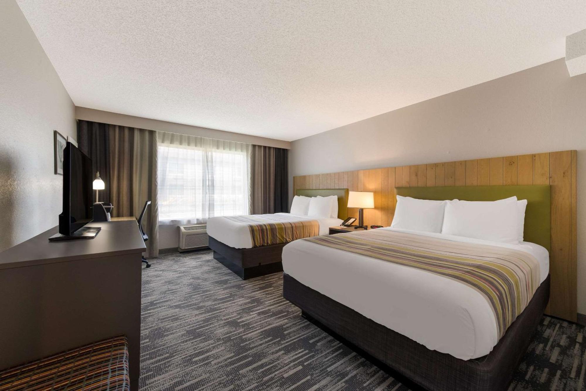 Country Inn & Suites By Radisson, Wichita East, Ks מראה חיצוני תמונה